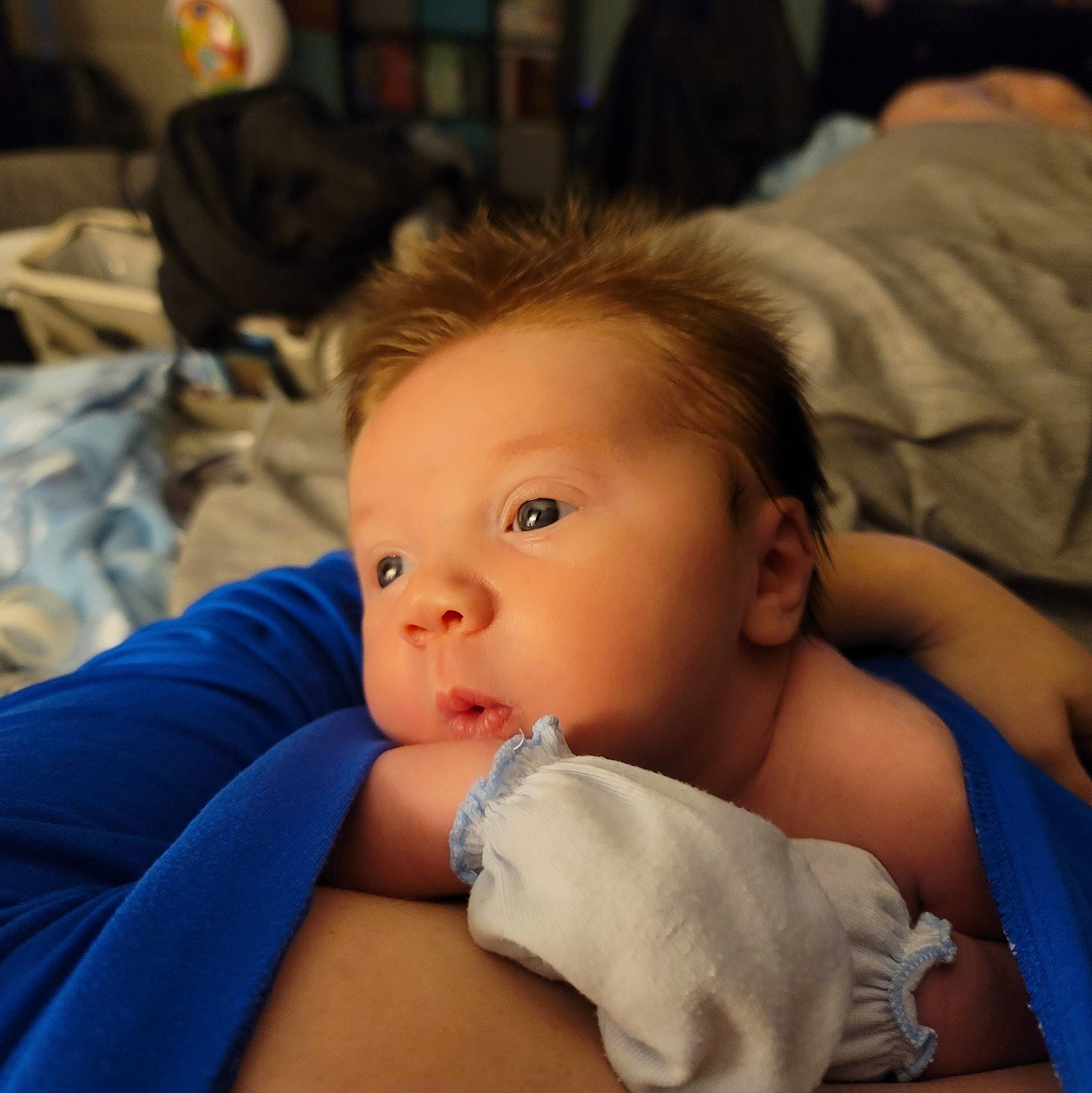 James is registered to the contest to win money with this photo: abdomen, baby, baby_toddler_clothing, cheek, chest, child, comfort, elbow, electric_blue, eyelash, finger, fun, gesture, happy, nail, person, sitting, skin, thumb, toddler