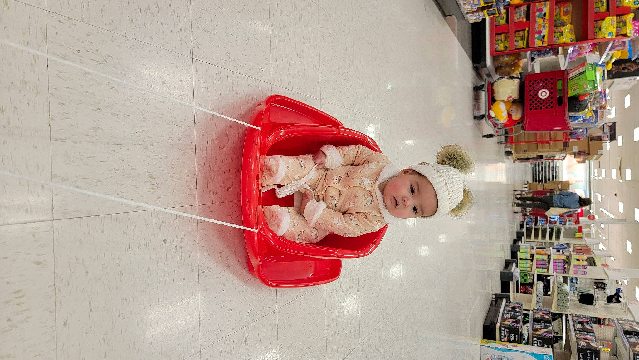 Nora joined the competition — help win amazing prizes! baby, building, carmine, child, fun, headwear, person, retail, room, shelf, shelving, toddler, wood