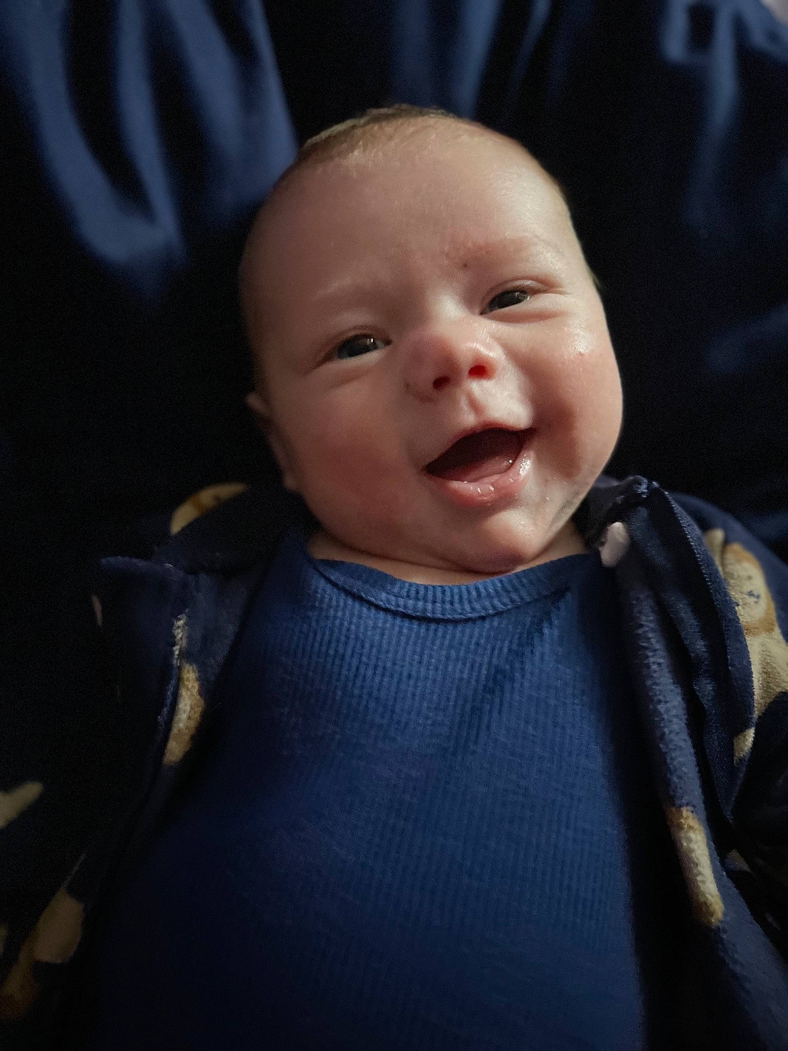 Frank is registered to the contest to win money with this photo: baby, baby_products, baby_toddler_clothing, cheek, child, collar, comfort, electric_blue, eyebrow, flash_photography, happy, iris, laugh, nose, person, polar_fleece, skin, sleeve, smile, textile