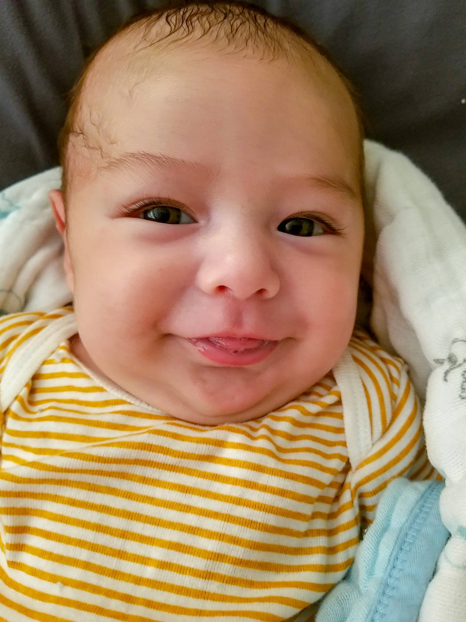 Teo is registered to the contest to win money with this photo: baby, beauty, cheek, child, chin, close_up, eye, eyebrow, face, facial_expression, forehead, head, iris, joy, lip, mouth, nose, person, skin, smile