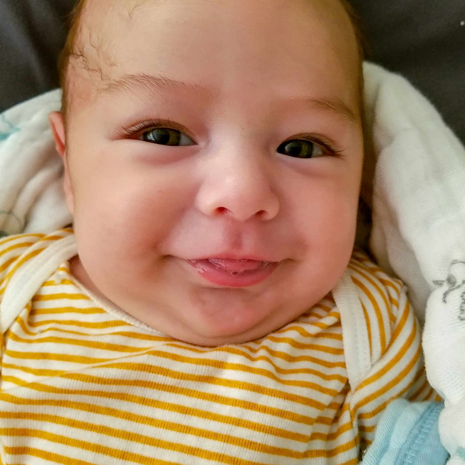 Teo is registered to the contest to win money with this photo: baby, beauty, cheek, child, chin, close_up, eye, eyebrow, face, facial_expression, forehead, head, iris, joy, lip, mouth, nose, person, skin, smile