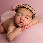 Nellie is registered to the contest to win money with this photo: adorable, baby, blanket, calm, child, closeup, cute, face, flower_headband, hands, head, infant, newborn, peaceful, pink, portrait, resting, skin, sleeping, soft