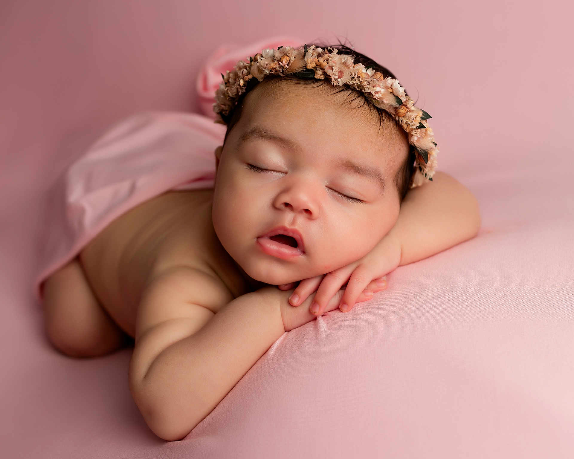 Nellie is registered to the contest to win money with this photo: adorable, baby, blanket, calm, child, closeup, cute, face, flower_headband, hands, head, infant, newborn, peaceful, pink, portrait, resting, skin, sleeping, soft