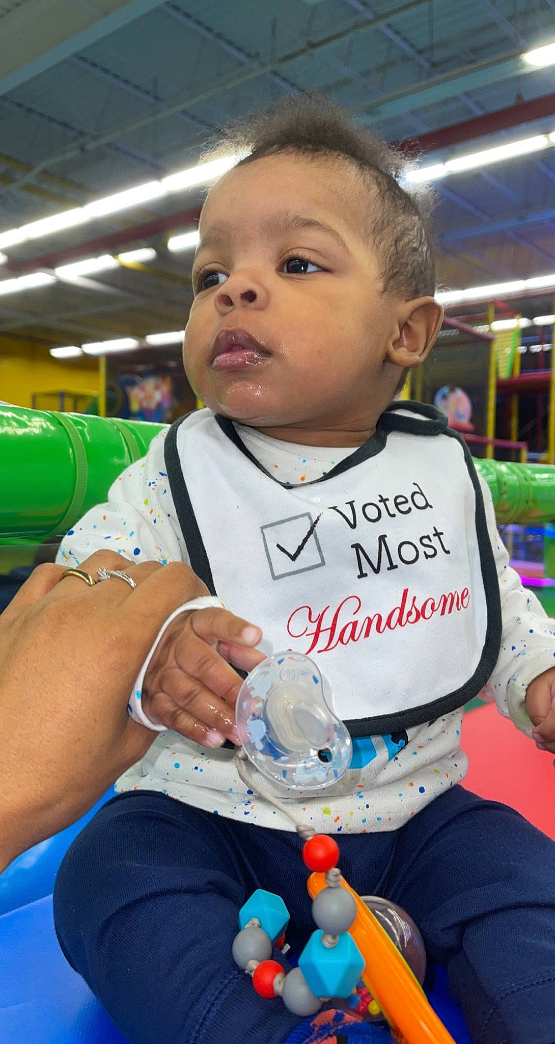 Braiden is registered to the contest to win money with this photo: arm, baby, baby_products, baby_toddler_clothing, blue, cheek, child, event, fun, hairstyle, happy, leisure, organ, person, recreation, service, sitting, skin, t_shirt, toddler