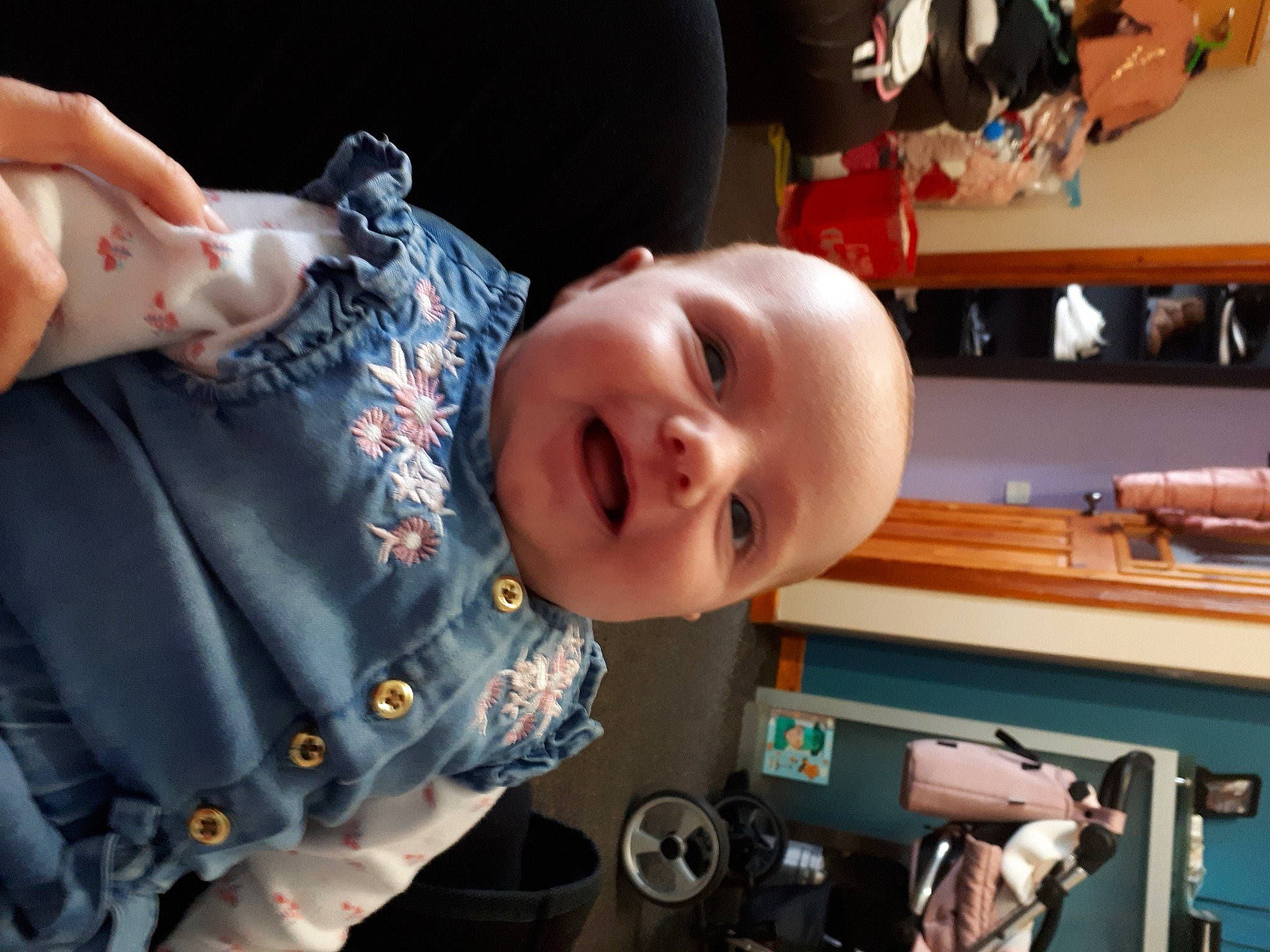 Olivia is registered to the contest to win money with this photo: arm, baby, cheek, child, ear, finger, mouth, person, smile, toddler