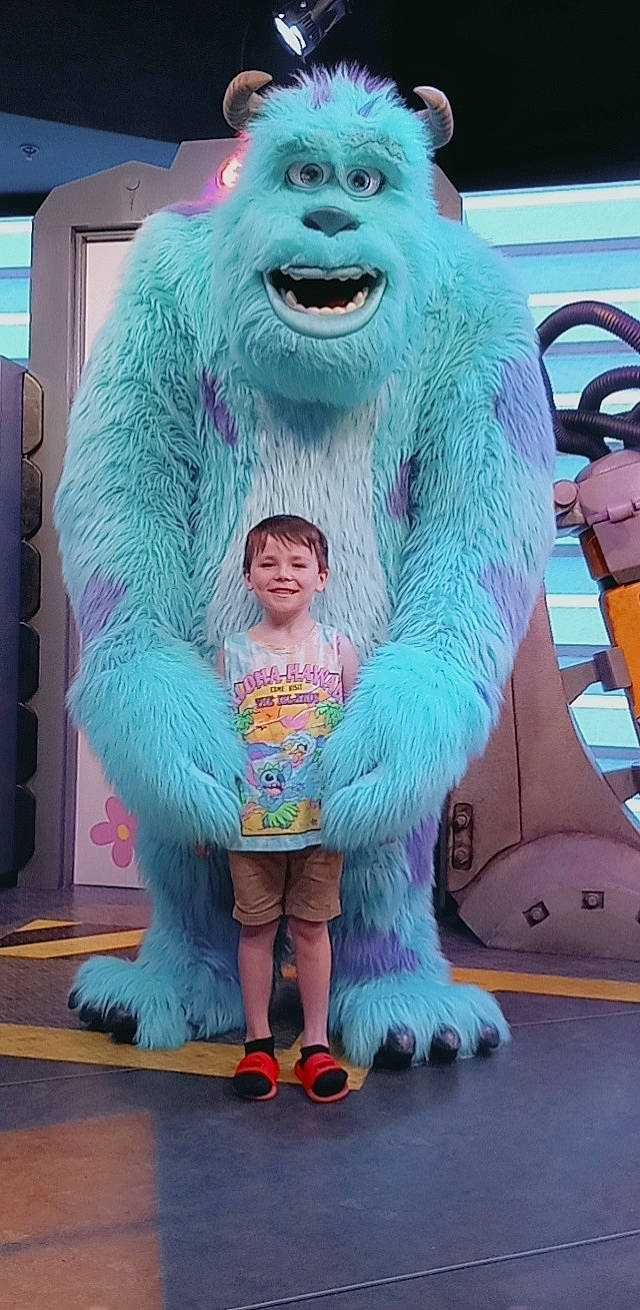 Drake joined the competition — help win amazing prizes! art, blue, child, event, fictional_character, flooring, fun, fur, green, joy, leisure, magenta, mammal, mascot, person, photograph, pink, purple, snapshot, t_shirt