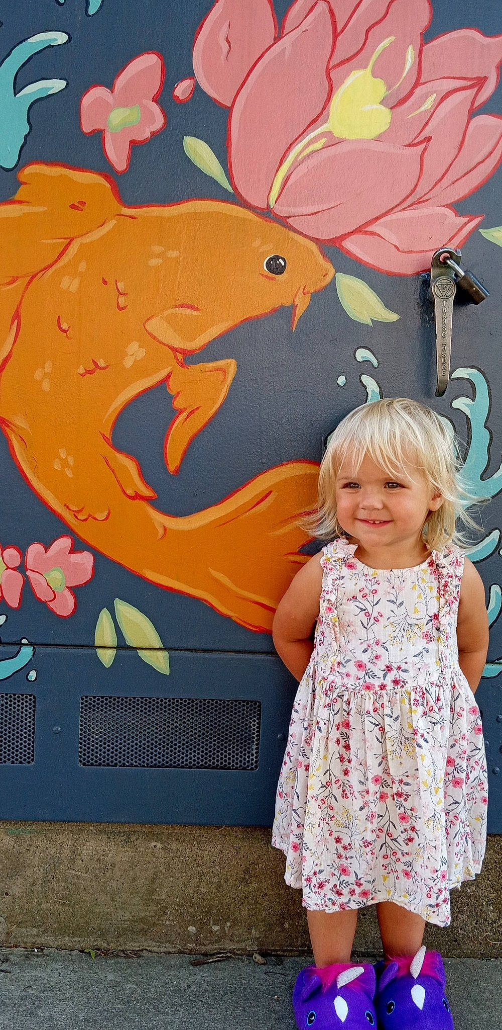 Charlie is registered to the contest to win money with this photo: art, baby_toddler_clothing, child, day_dress, drawing, dress, fun, happy, joy, magenta, mural, one_piece_garment, orange, organ, painting, party_supply, pattern, person, pink, smile
