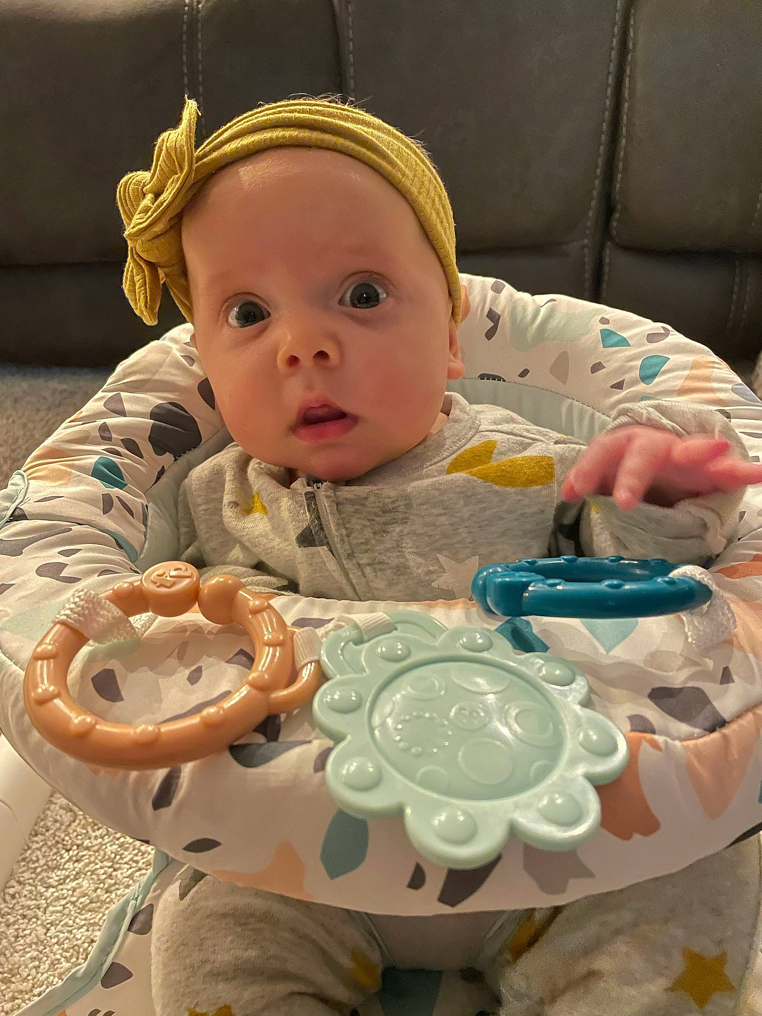 Charley is registered to the contest to win money with this photo: baby, baby_products, baby_safety, baby_toddler_clothing, baby_toys, ceramic, cheek, child, dishware, drinkware, home_accessories, linens, mouth, person, porcelain, room, serveware, sitting, skin, surprise