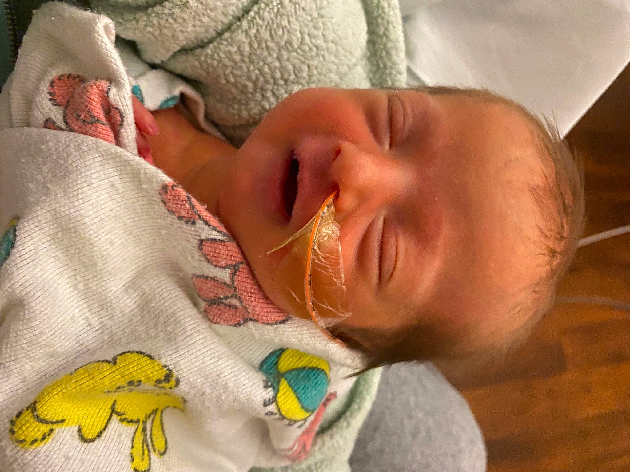 Alanna is registered to the contest to win money with this photo: baby_sleeping, cheek, comfort, ear, eye, eyebrow, finger, hand, head, human_body, iris, lip, mouth, nose, organ, person, skin, textile, vertebrate, white