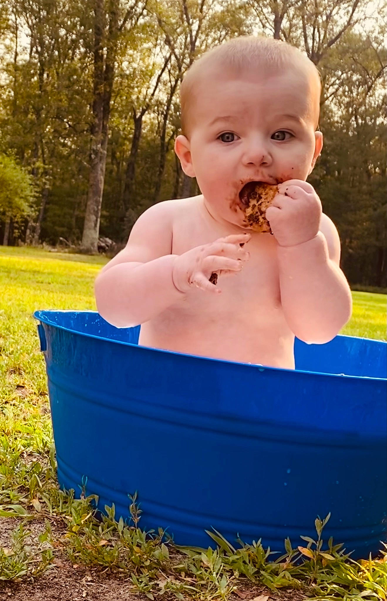 Jamison is registered to the contest to win money with this photo: baby, baby_bathing, baby_toddler_clothing, child, face, fun, garden, gesture, grass, happy, leisure, people_in_nature, person, plant, play, recreation, sitting, thumb, toddler, tree