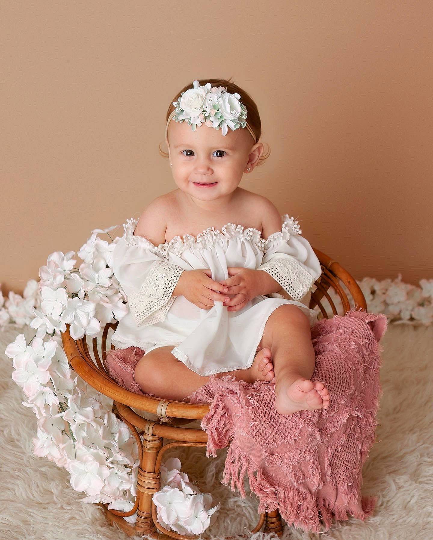 Kamille is registered to the contest to win money with this photo: baby_toddler_clothing, bridal_accessory, bridal_clothing, clothing, dress, embellishment, eye, flash_photography, hair, happy, head, headgear, headpiece, headwear, human_body, iris, joy, person, pink, skin