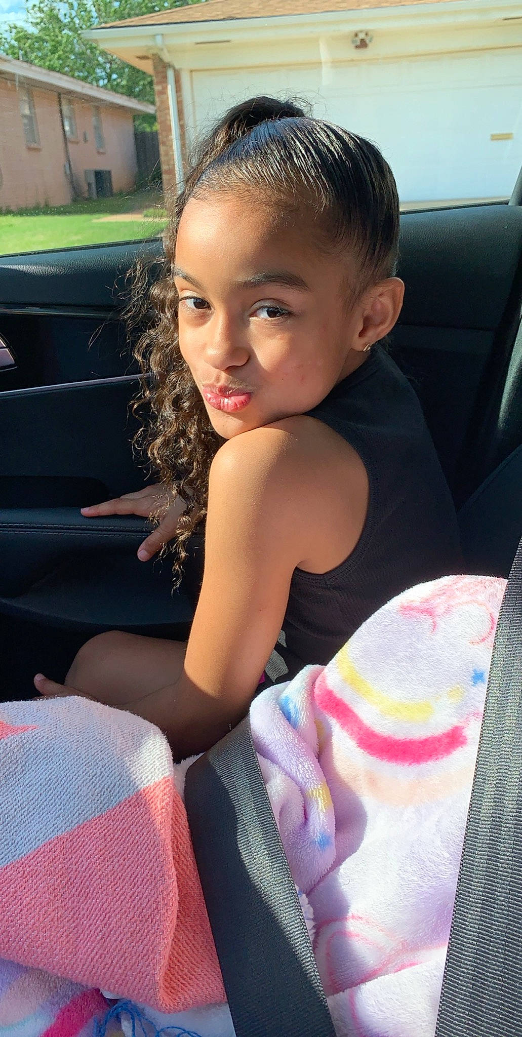 Kaylen is registered to the contest to win money with this photo: auto_part, car, car_seat, child, family_car, hair, hairstyle, long_hair, person, seat_belt, smile, toddler, vacation, vehicle