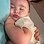 Jameson joined the competition — help win amazing prizes! arm, baby, bed, bedroom, bodypart, cushion, diaper, face, furniture, head, homedecor, hugging, indoors, kissing, newborn, person, photography, portrait, room, sleeping