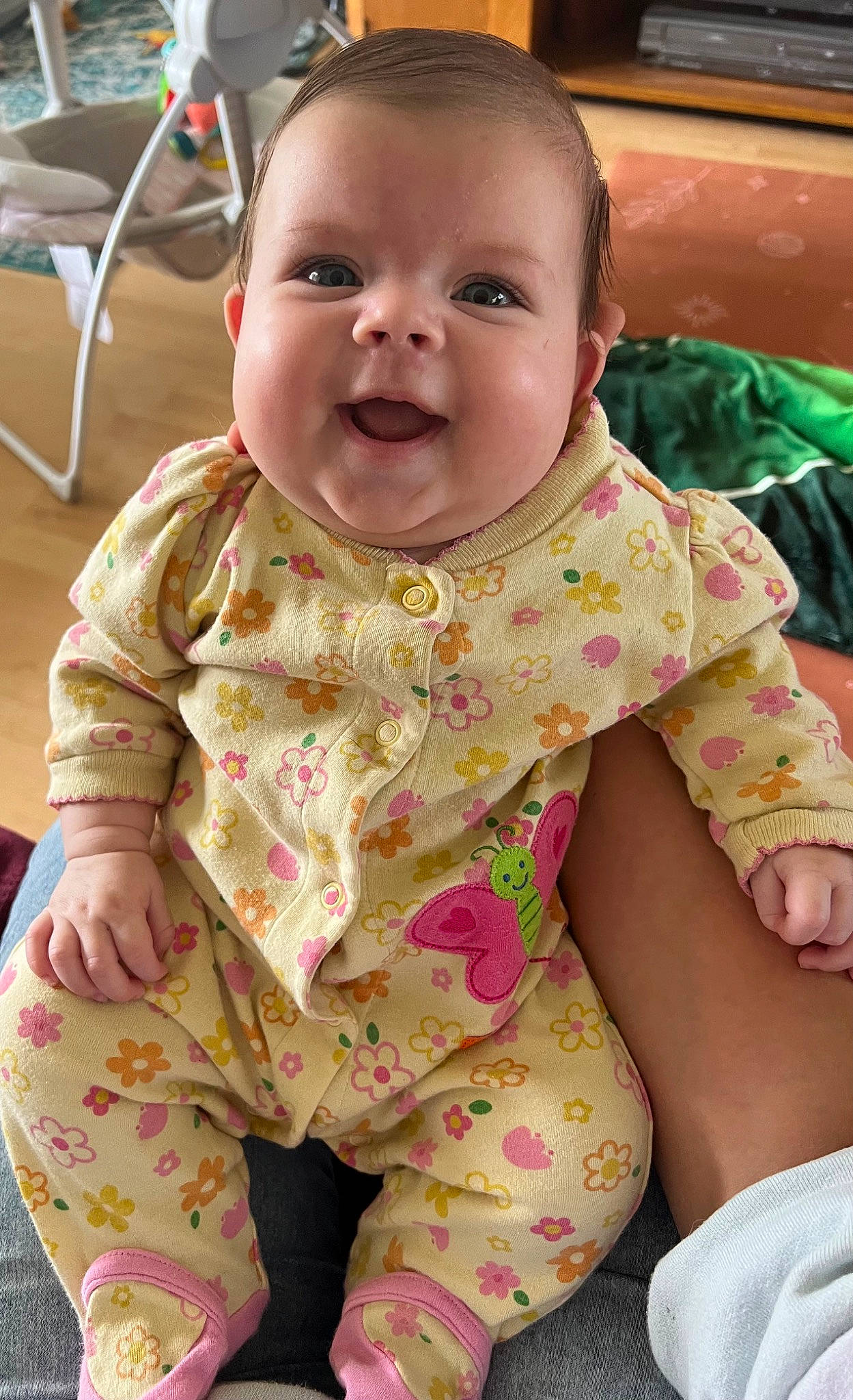 Rosilyn is registered to the contest to win money with this photo: baby, baby_toddler_clothing, cheek, child, eye, face, facial_expression, finger, happy, head, human_body, iris, neck, nose, person, pink, skin, sleeve, smile, textile