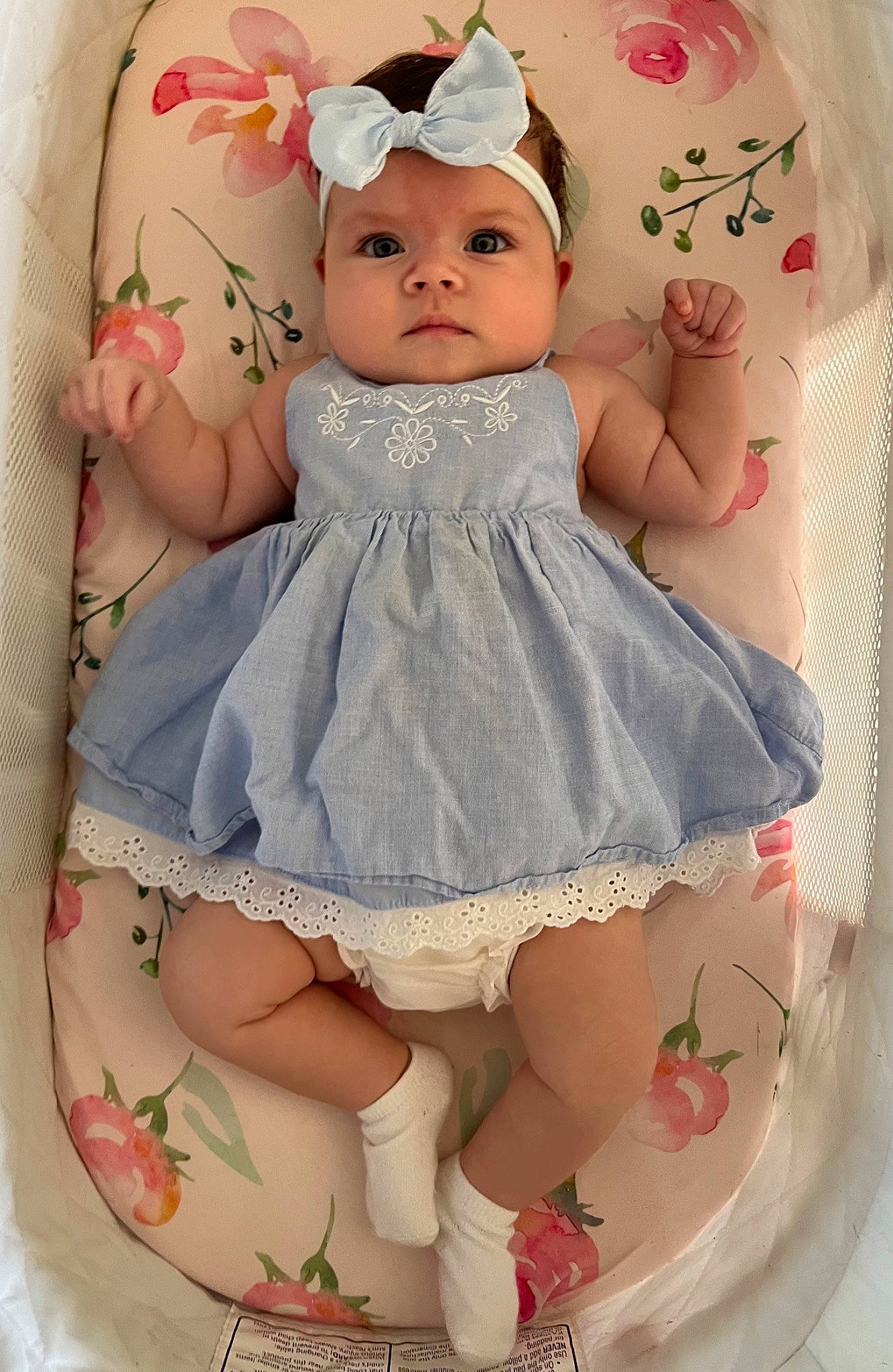 Rosilyn is registered to the contest to win money with this photo: arm, baby, baby_toddler_clothing, cheek, child, doll, dress, embellishment, eyelash, headwear, iris, organ, pattern, person, pink, product, skin, sleeve, textile, toddler