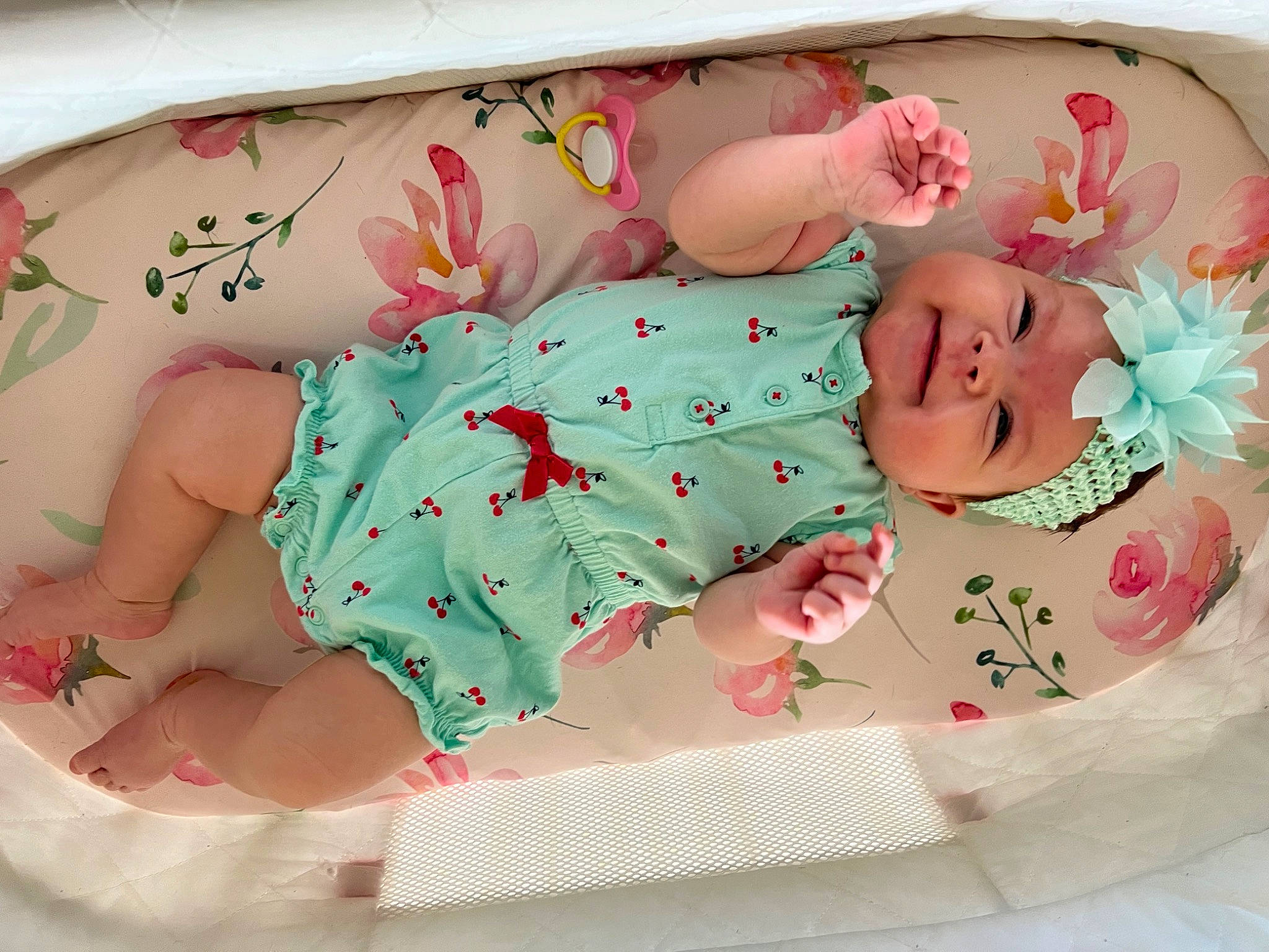 Rosilyn is registered to the contest to win money with this photo: arm, baby, baby_products, baby_sleeping, baby_toddler_clothing, child, comfort, dress, fashion_accessory, hand, head, headgear, headwear, linens, pattern, person, pink, product, skin, sleeve