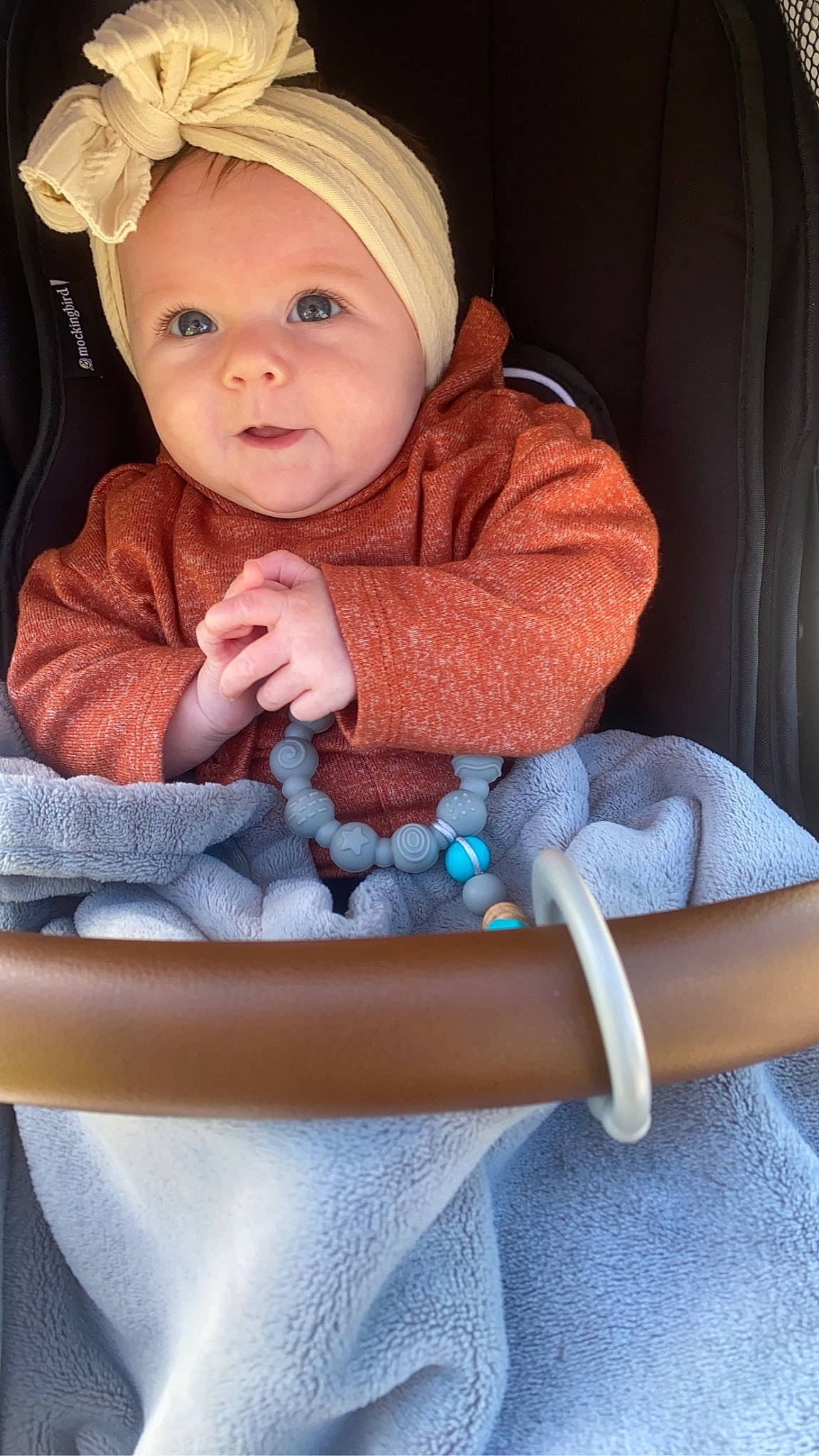 Reyna joined the competition — help win amazing prizes! baby, baby_carriage, baby_products, baby_safety, baby_toddler_clothing, chair, cheek, child, comfort, curtain, eye, face, hand, human_body, iris, person, product, skin, sleeve, smile