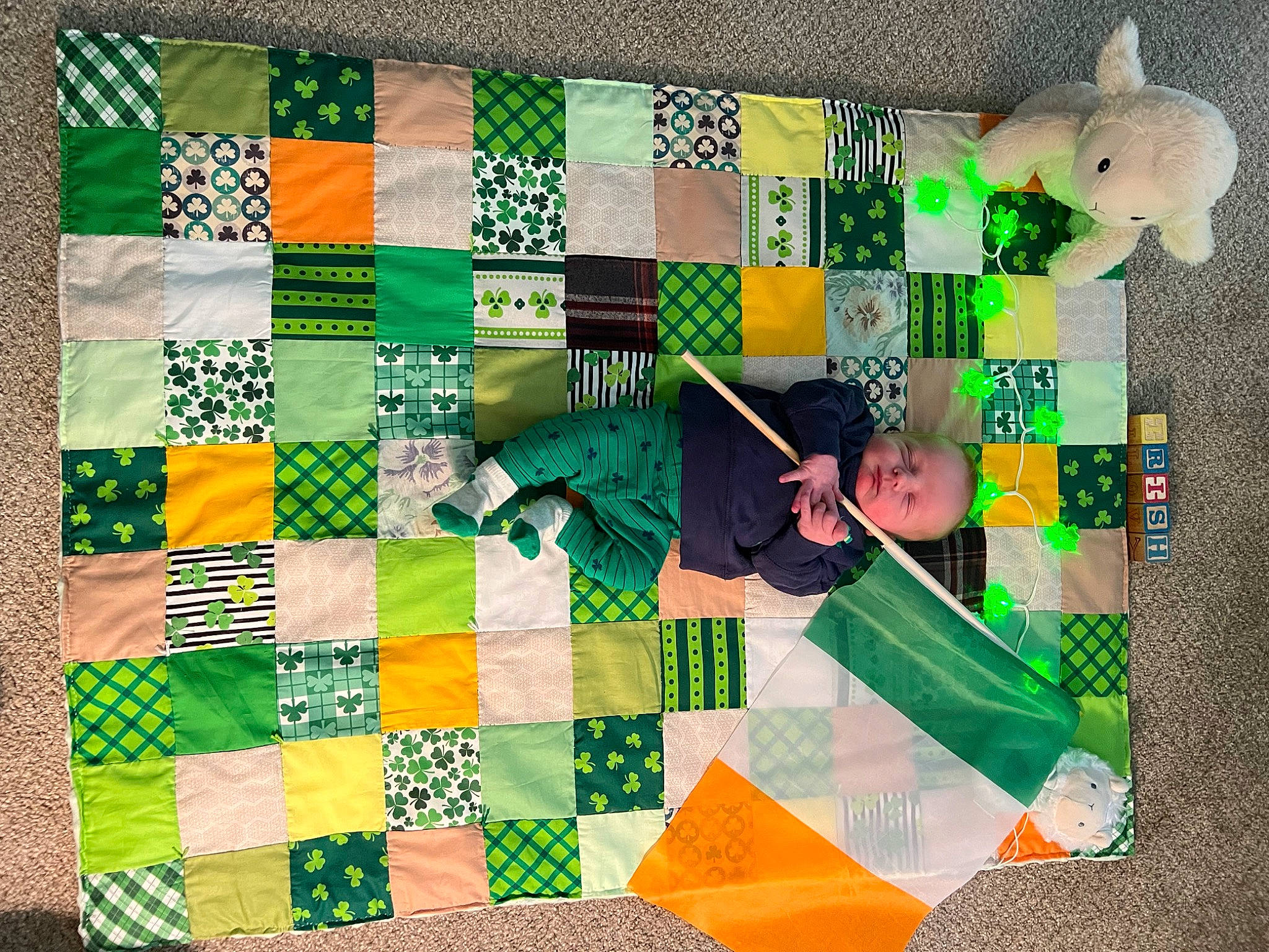 Cashel is registered to the contest to win money with this photo: art, baby_products, child, craft, creative_arts, design, green, linens, pattern, person, play, product, rectangle, room, symmetry, textile, tints_and_shades, toddler, toy, visual_arts