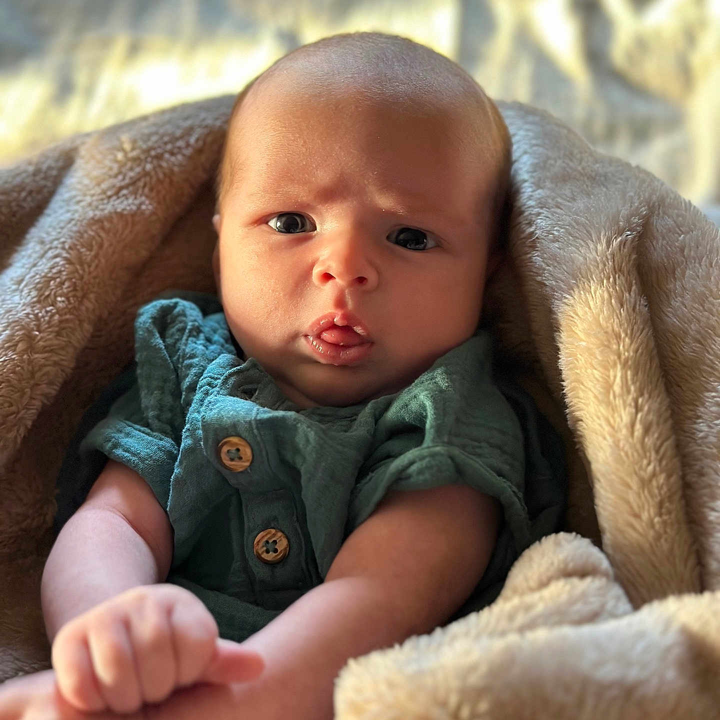 Elijah joined the competition — help win amazing prizes! baby, bed, blanket, bodypart, cushion, face, finger, frown, hand, happy, head, homedecor, newborn, person, photography, portrait, quilt, sad, smile, towel