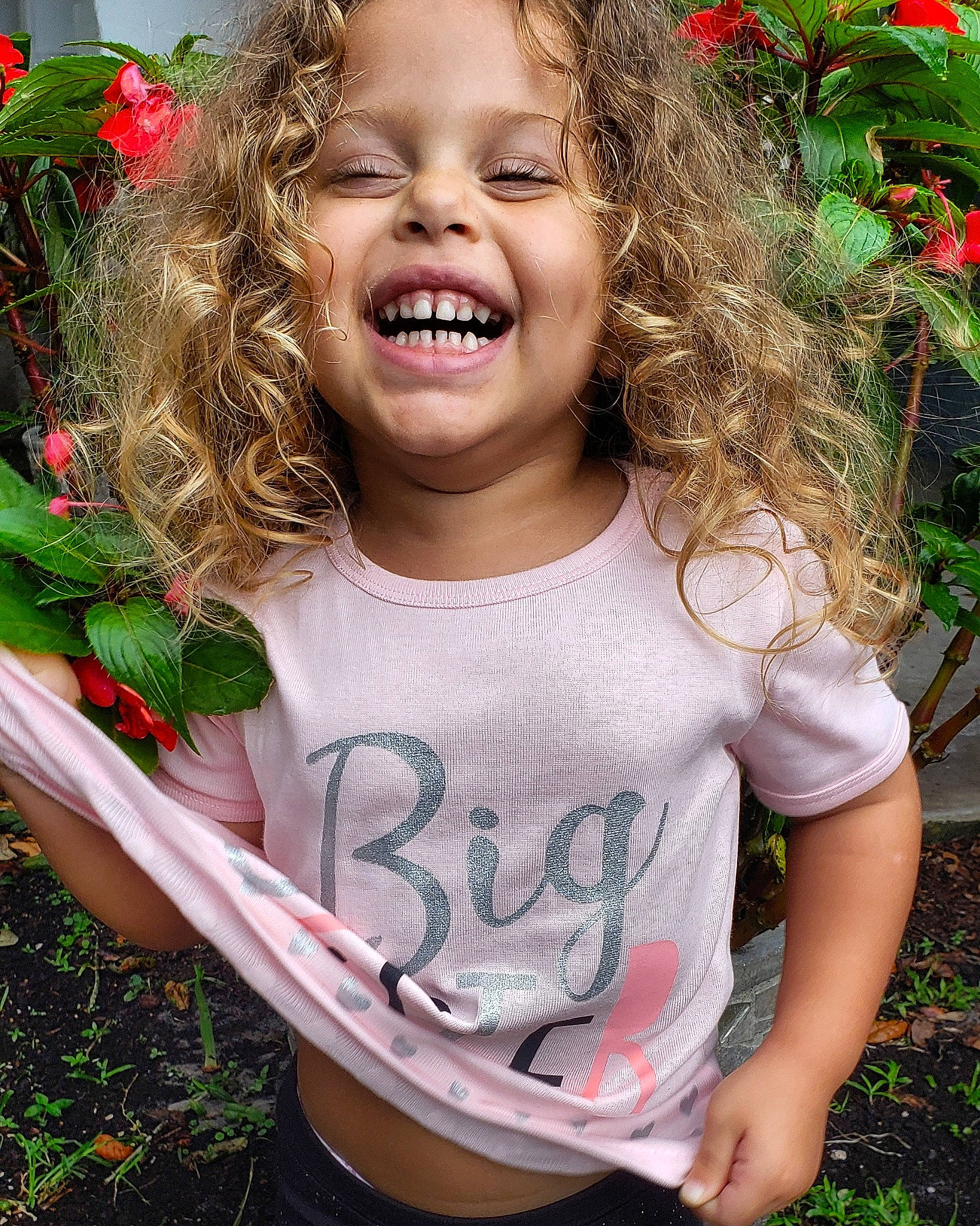 Alexandria is registered to the contest to win money with this photo: botany, chin, face, facial_expression, flower, gesture, grass, hair, hairstyle, happy, head, iris, joy, leaf, lip, organ, people_in_nature, person, pink, plant