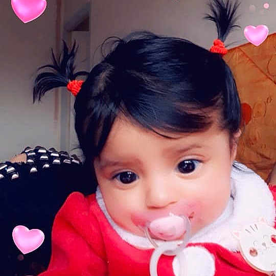 Lya participe au concours pour gagner de l'argent avec cette photo : beauty, black_hair, cheek, child, facial_expression, girl, happiness, heart, human_hair_color, infant, joy, lip, mouth, nose, organ, person, petal, pink, red, skin