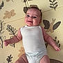 Hannah participe au concours pour gagner de l'argent avec cette photo : baby, smiling, infant, onesie, play_mat, child, cute, happy, lying_down, skin, arm, leg, head, face, indoor, pattern, fabric, person, young, babywear