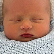 Noa is registered to the contest to win money with this photo: baby, newborn, sleeping, blanket, knitted, blue, infant, face, peaceful, cute, child, portrait, wrapped, soft, closeup, head, skin, calm, resting, adorable