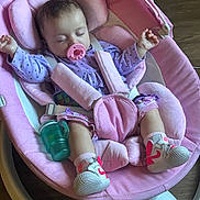 Jersey joined the competition — help win amazing prizes! baby, infant, sleeping, pacifier, pink, baby_rocker, sneakers, sippy_cup, clothing, child, indoor, wood_floor, digital_display, toy, cute, relaxing, comfort, seat_belt, toddler, resting