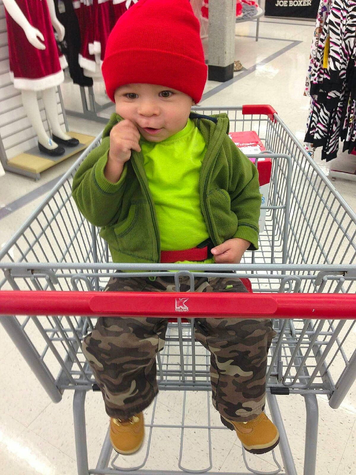 Andre is registered to the contest to win money with this photo: cart, child, person, shopping, shopping_cart, supermarket, toddler, vehicle