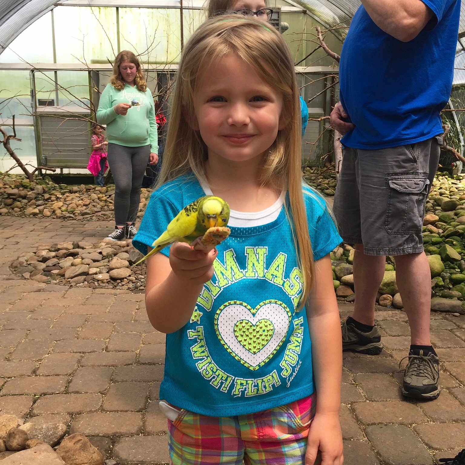 Taryn is registered to the contest to win money with this photo: child, day, fun, girl, joy, pattern, person, plaid, product, public_space, recreation, smile, summer, toddler, tree, vacation, vertebrate, world