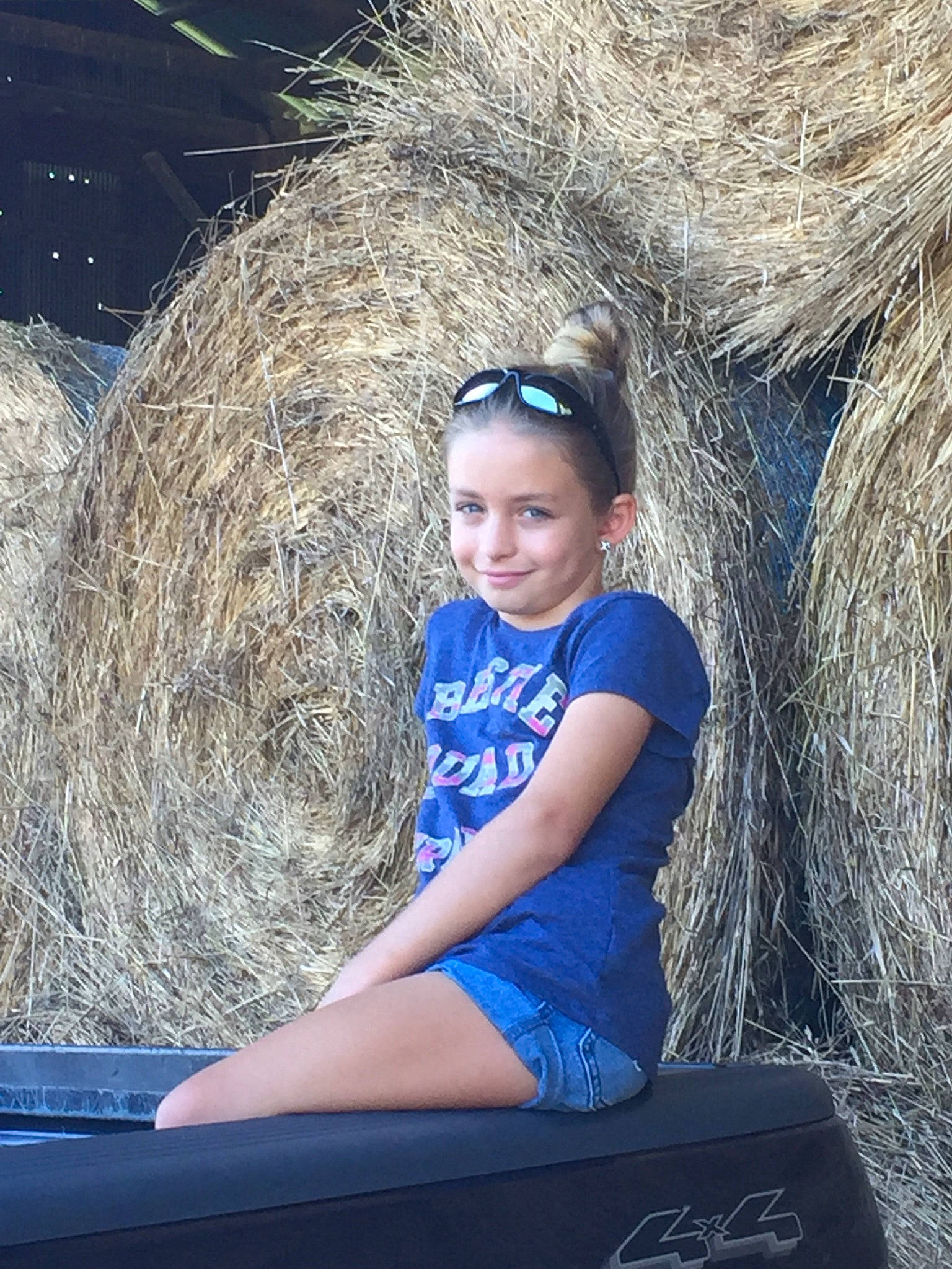 Taylor joined the competition — help win amazing prizes! child, fawn, fun, fur, grass, hair, hairstyle, hay, joy, long_hair, person, photography, plant, straw