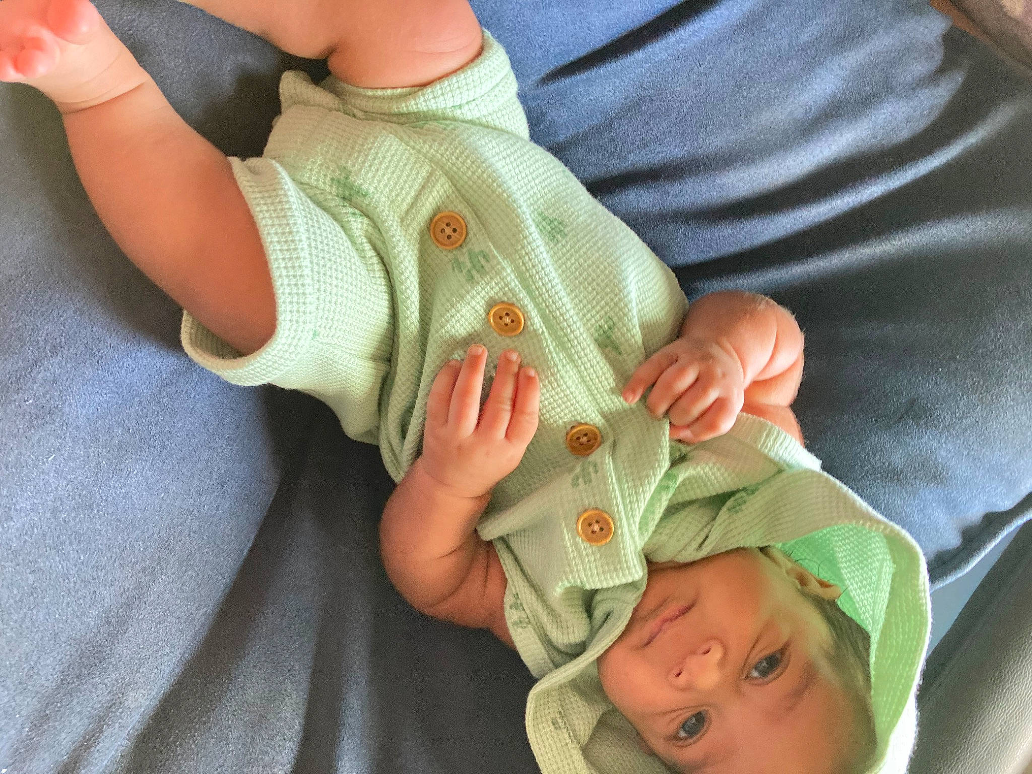 Arie is registered to the contest to win money with this photo: baby, baby_products, baby_toddler_clothing, child, comfort, finger, foot, gesture, grass, health_care, human_leg, knee, nail, person, service, skin, thigh, thumb, toddler, wrist
