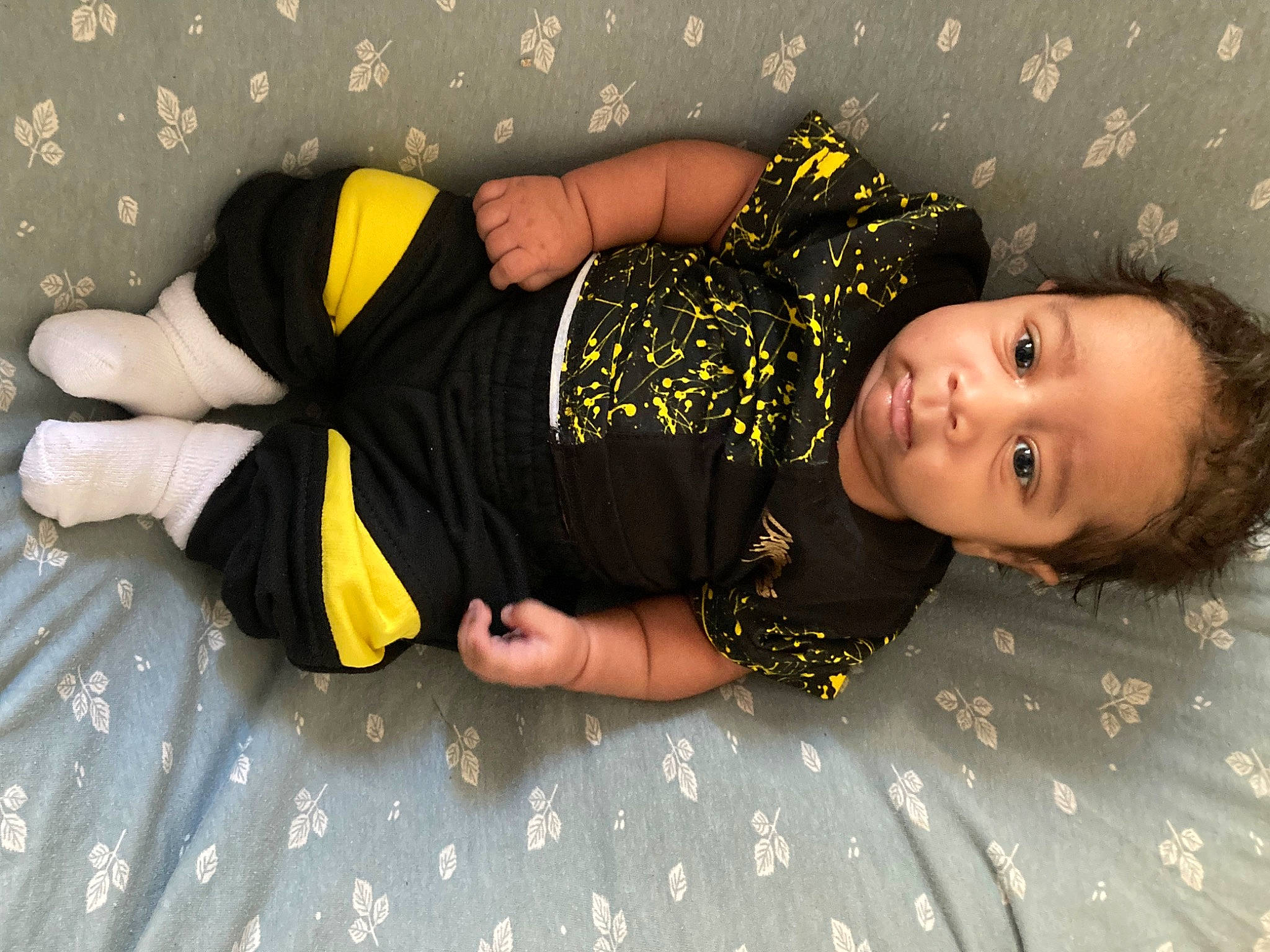 Arie joined the competition — help win amazing prizes! arm, baby_toddler_clothing, comfort, dress, flash_photography, flooring, fun, happy, human_body, human_leg, joint, knee, leg, pattern, person, sitting, sleeve, smile, thigh, toddler