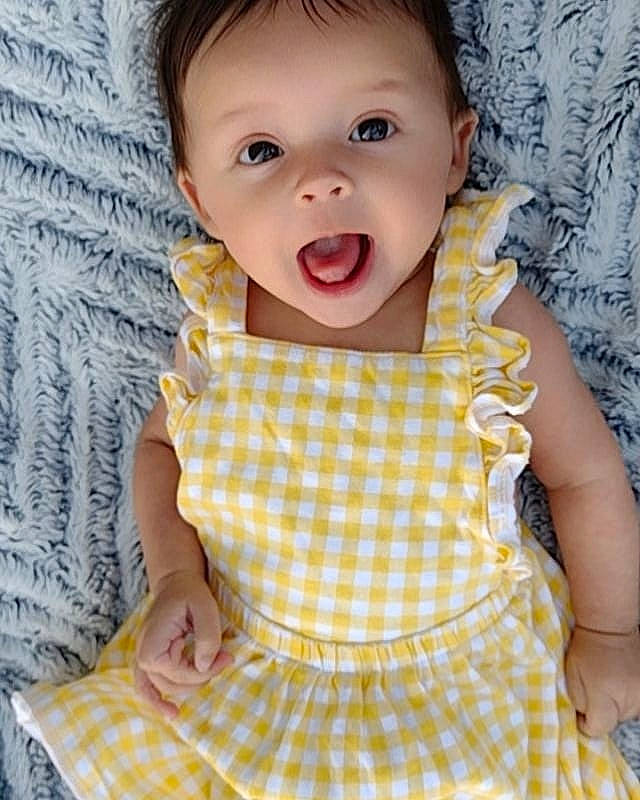Joy joined the competition — help win amazing prizes! baby, baby_products, baby_toddler_clothing, cheek, child, collar, day_dress, eyelash, happy, linens, one_piece_garment, pattern, person, pink, skin, sleeve, smile, surprise, t_shirt, toddler