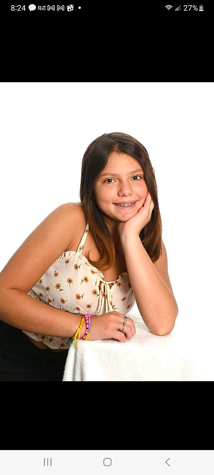 Alexandra is registered to the contest to win money with this photo: arm, elbow, eyelash, face, fashion_design, flash_photography, formal_wear, gesture, hair, hand, happy, joy, long_hair, neck, outerwear, person, shoulder, skin, sleeve, smile