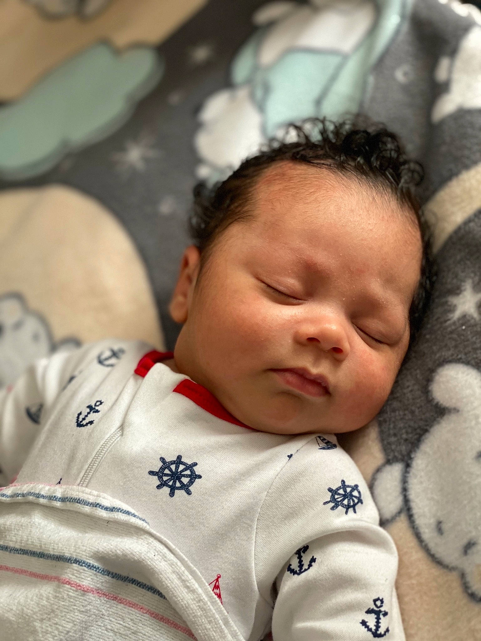 Koda is registered to the contest to win money with this photo: baby, baby_toddler_clothing, cheek, chin, comfort, eyebrow, face, facial_expression, finger, forehead, hair, happy, head, mouth, nose, person, skin, sleeve, textile, toddler