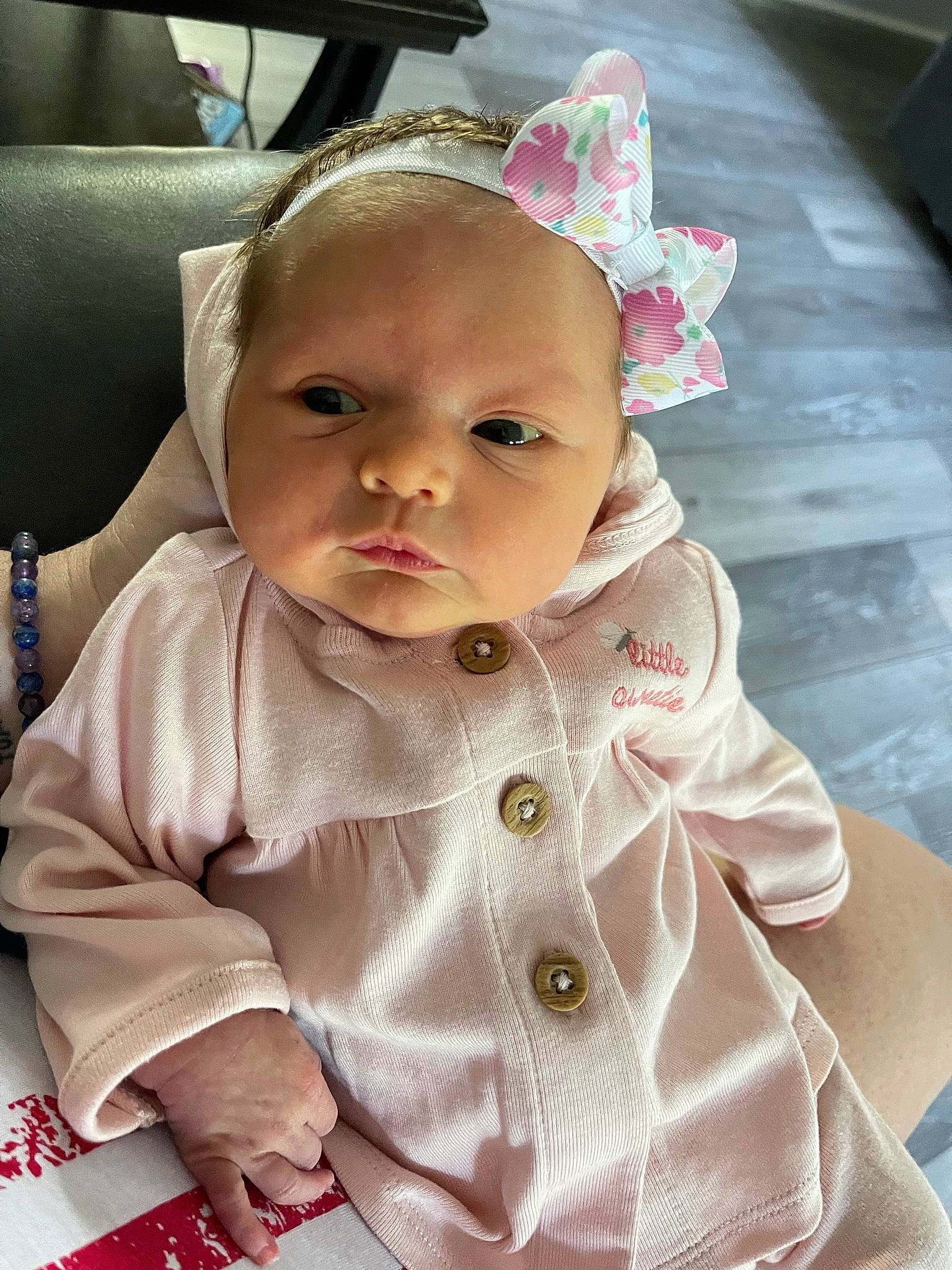 Brelynn joined the competition — help win amazing prizes! baby, baby_products, baby_toddler_clothing, cheek, collar, comfort, dress, dress_shirt, eye, face, facial_expression, head, linens, lip, nose, person, pink, sitting, skin, sleeve