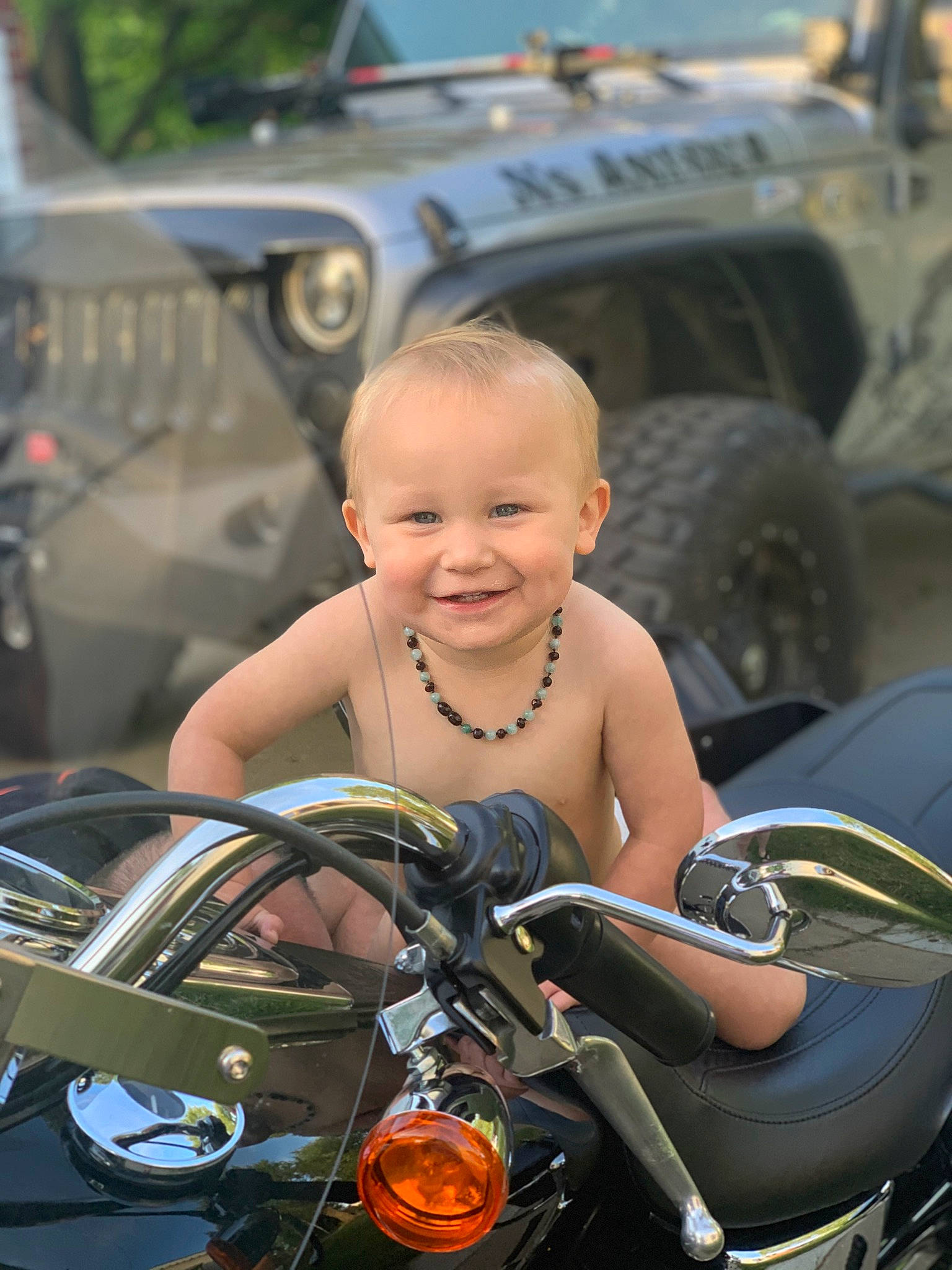 Liam joined the competition — help win amazing prizes! automotive_design, automotive_exterior, automotive_lighting, automotive_tire, automotive_wheel_system, bumper, fender, glass, headlamp, hood, joy, land_vehicle, mode_of_transport, motor_vehicle, person, rim, smile, tire, toy, vehicle
