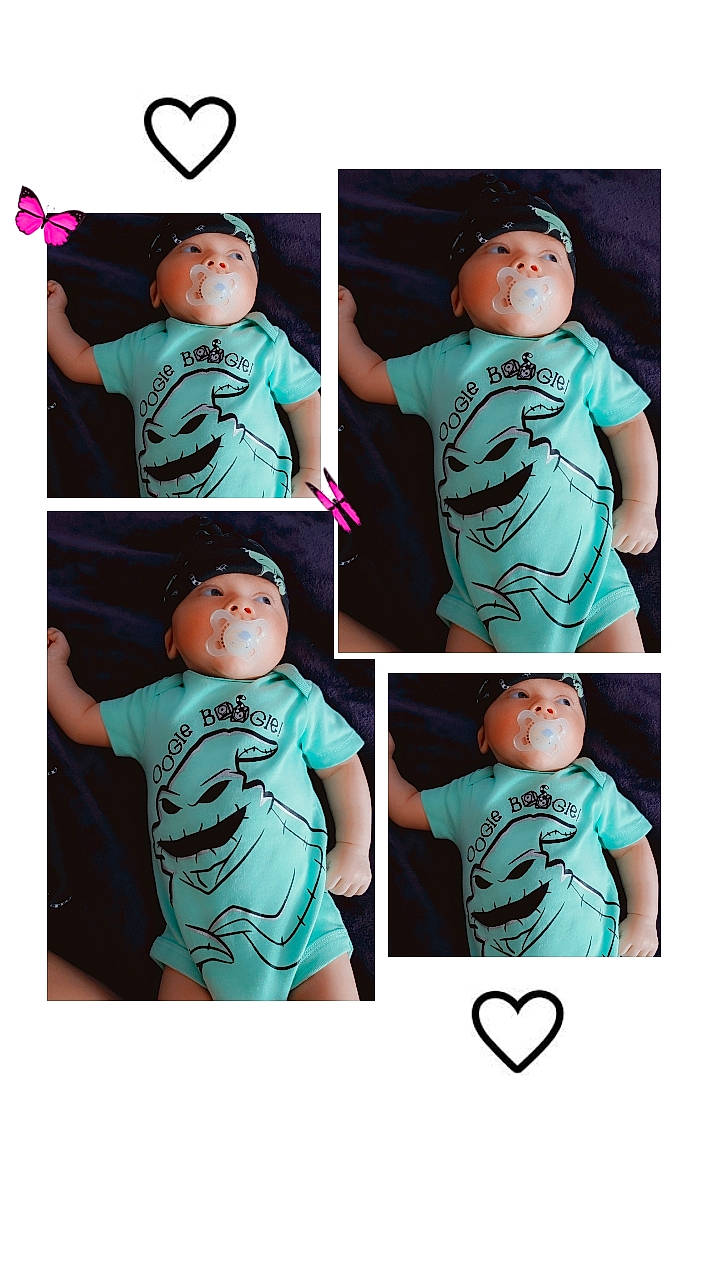 Isaiah is registered to the contest to win money with this photo: arm, azure, clothing, facial_expression, gesture, green, hairstyle, hand, head, headwear, joint, neck, outerwear, person, photograph, product, shirt, shoulder, sleeve, standing