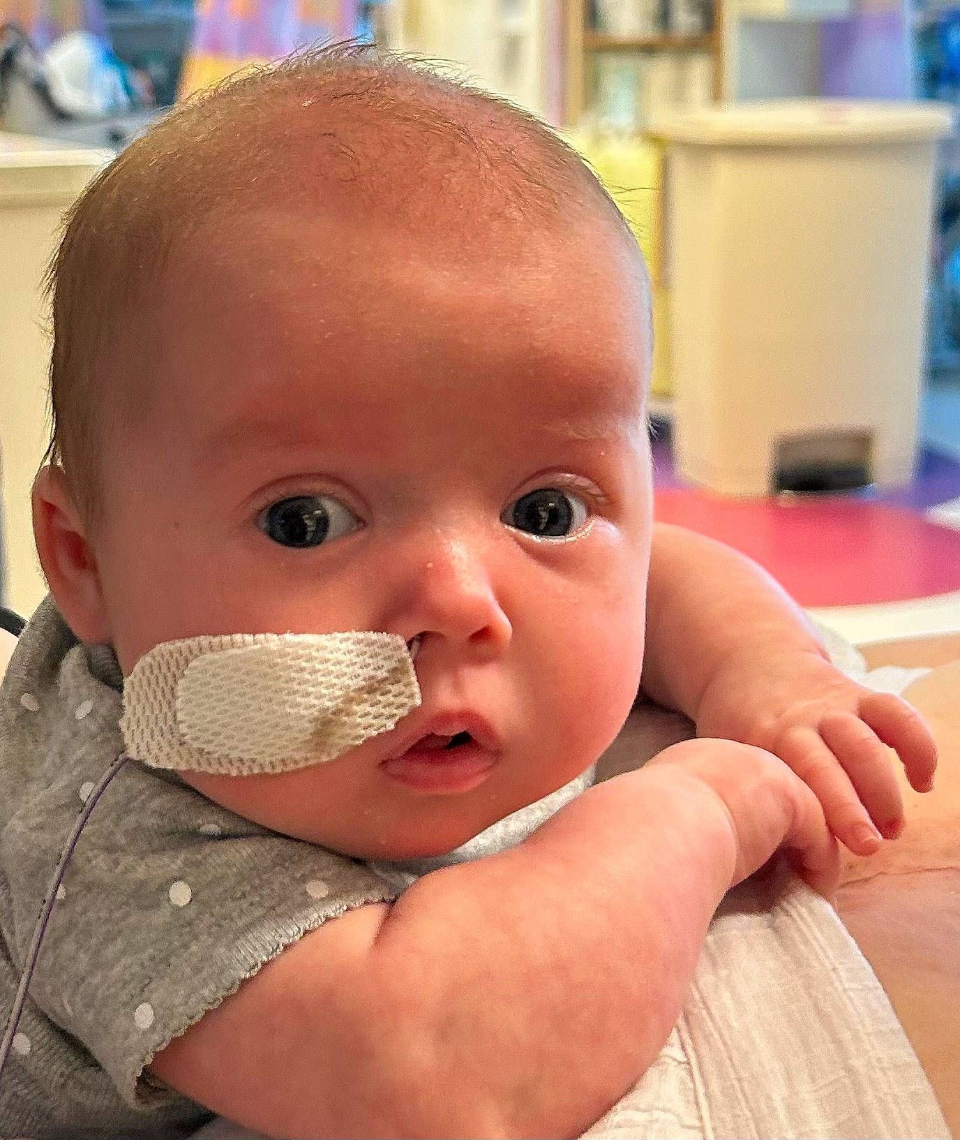 Adaline is registered to the contest to win money with this photo: baby, baby_toddler_clothing, cheek, ear, eye, eyebrow, eyelash, finger, forehead, gesture, happy, iris, lip, mouth, nail, neck, nose, person, skin, thumb