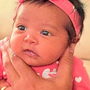 Valerie joined the competition — help win amazing prizes! baby, infant, headband, pink, hand, face, eyes, closeup, cute, child, person, newborn, apparel, soft, skin, portrait, expression, adorable, love, care