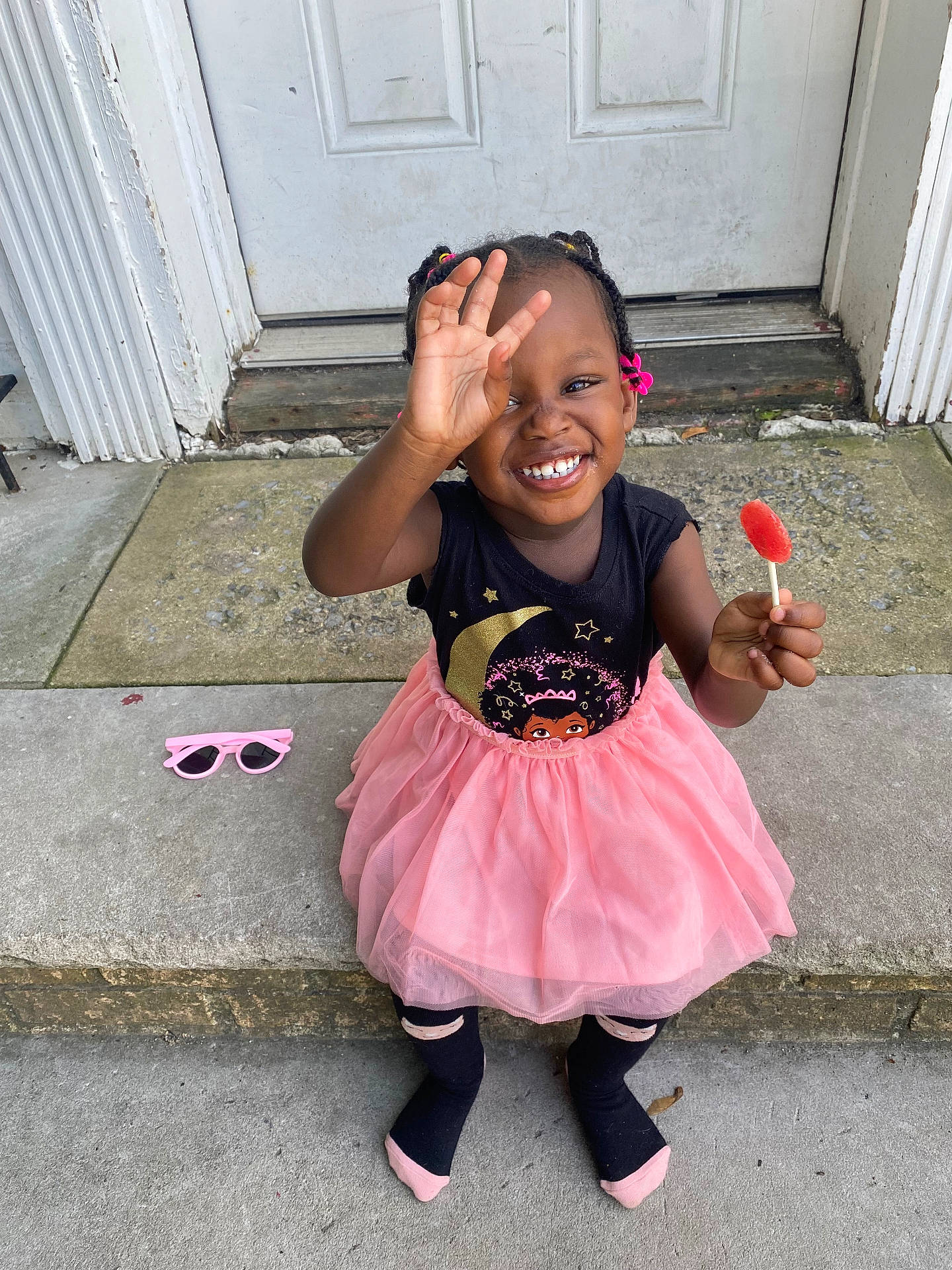 Skyelar is registered to the contest to win money with this photo: candy, child, city, clothing, cream, dessert, door, dress, face, female, food, girl, head, icecream, person, photography, portrait, road, summer, sweets