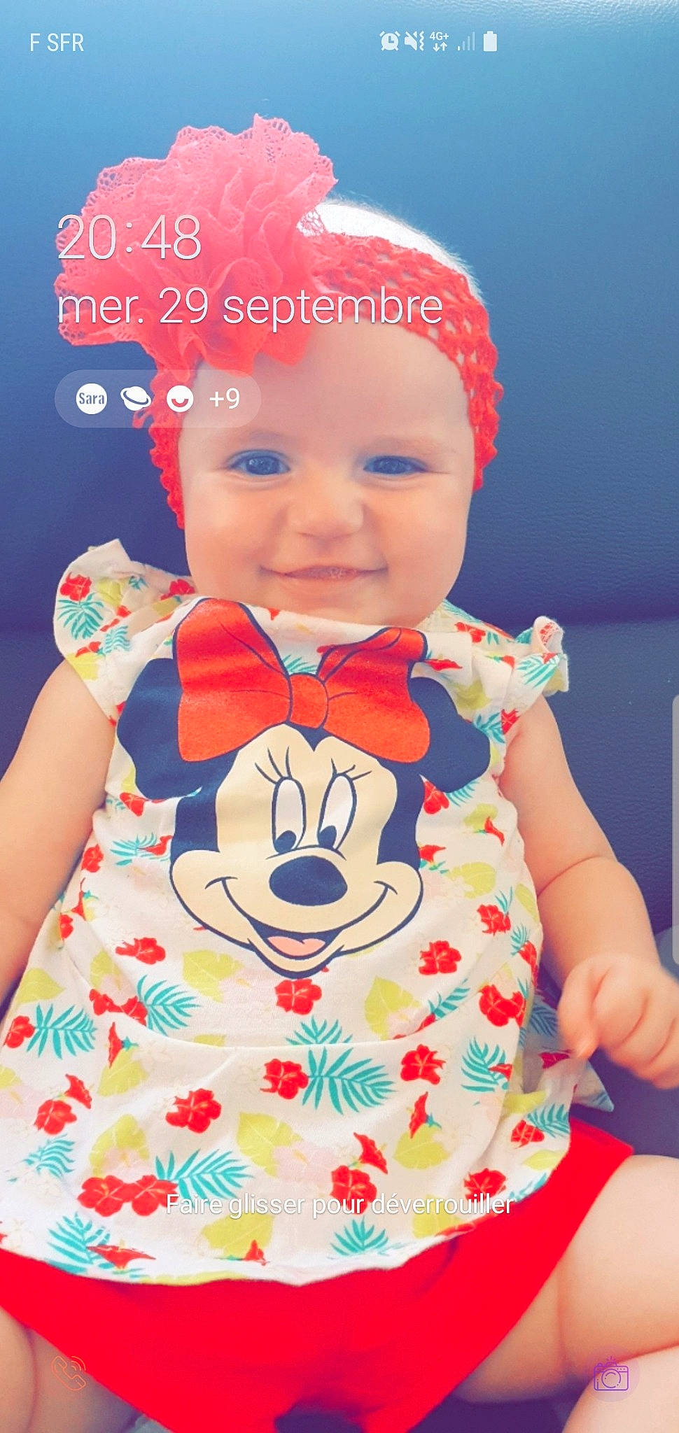 Myla participe au concours pour gagner de l'argent avec cette photo : baby, baby_toddler_clothing, cheek, child, dress, electric_blue, face, facial_expression, fun, happy, headwear, joy, pattern, person, pink, red, skin, sleeve, smile, t_shirt