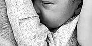 Isabella is registered to the contest to win money with this photo: arm, baby, black_and_white, close_up, cuddle, face, hand, infant, intimacy, love, newborn, parent, patterned_clothing, peaceful, person, skin, sleeping, soft, texture, warmth
