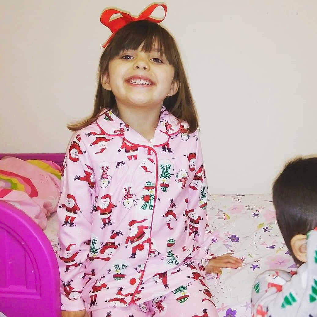 Sofie is registered to the contest to win money with this photo: baby_toddler_clothing, beauty, collar, dress, dress_shirt, facial_expression, fun, hairstyle, happy, joy, magenta, neck, pattern, person, pink, product, shirt, skin, sleeve, smile