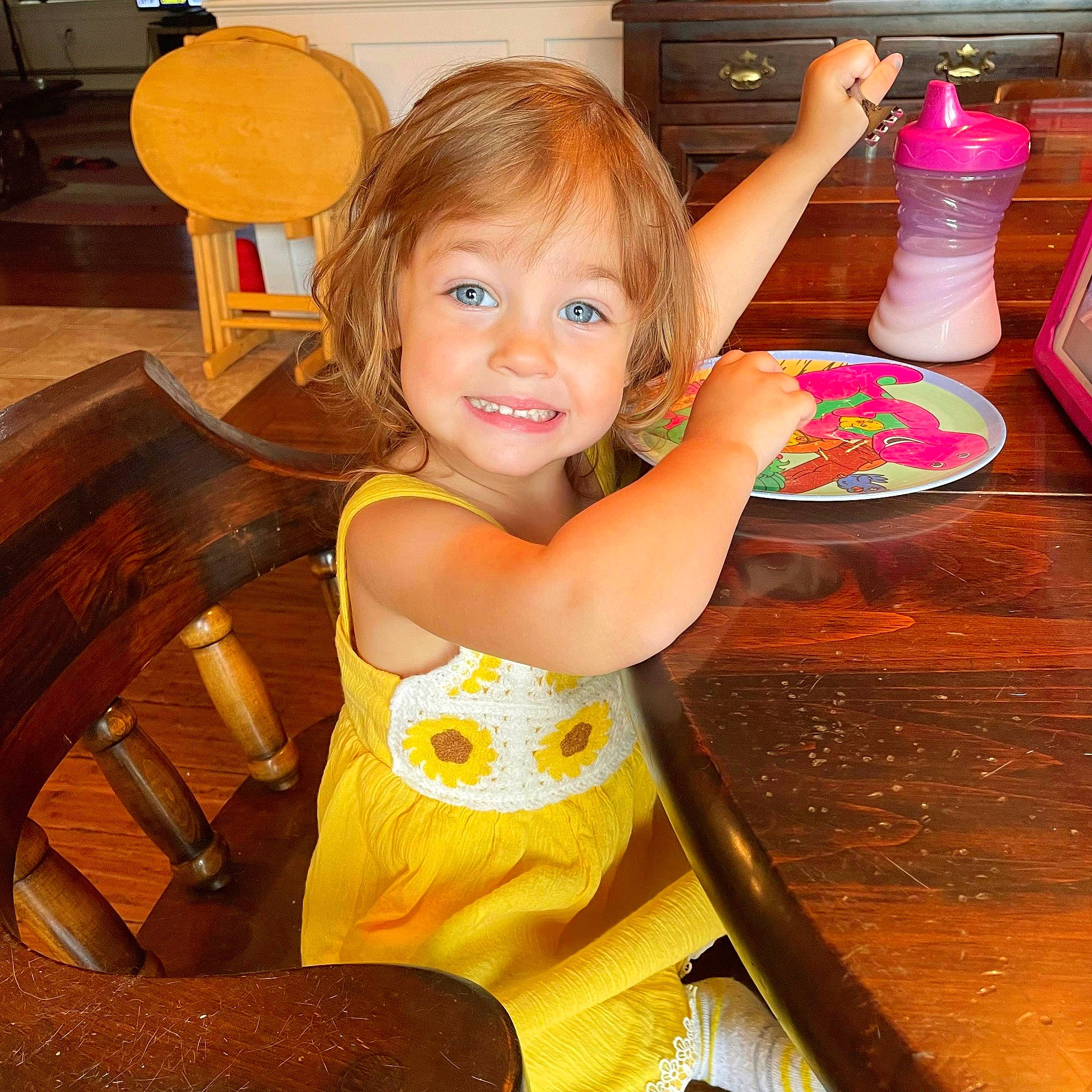 Cora joined the competition — help win amazing prizes! chair, child, eye, finger, fun, hair, happy, hardwood, head, joy, leisure, person, room, sitting, smile, t_shirt, table, tableware, thigh, toddler