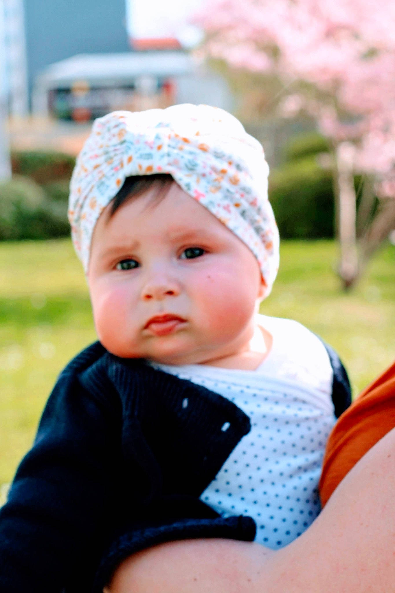 Camila a rejoint le concours — aidez-le/la à gagner de superbes lots ! baby, baby_toddler_clothing, cap, cheek, child, fun, grass, happy, headwear, leisure, lip, outerwear, pattern, person, pink, plant, recreation, skin, sleeve, street_fashion