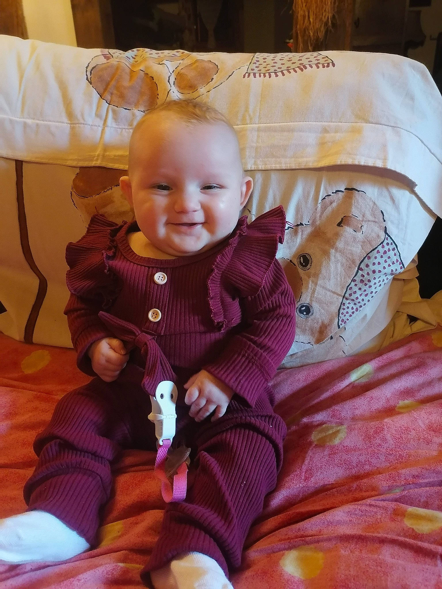 Elyna participe au concours pour gagner de l'argent avec cette photo : baby, baby_toddler_clothing, cheek, comfort, eye, face, facial_expression, happy, head, iris, mammal, person, pink, product, purple, skin, sleeve, smile, textile, toddler