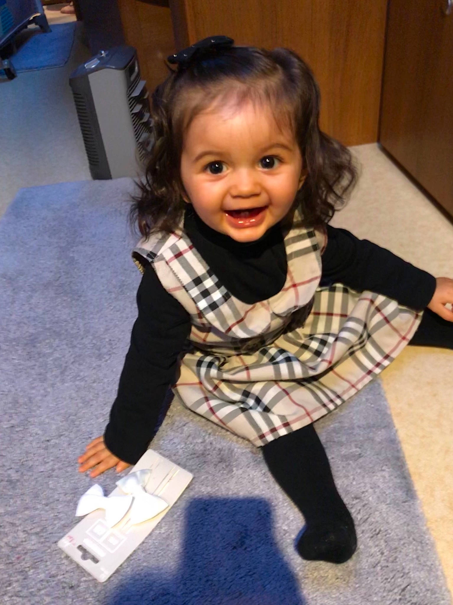 Mya participe au concours pour gagner de l'argent avec cette photo : child, child_model, girl, joy, neck, outerwear, pattern, person, plaid, product, scarf, smile, textile, toddler