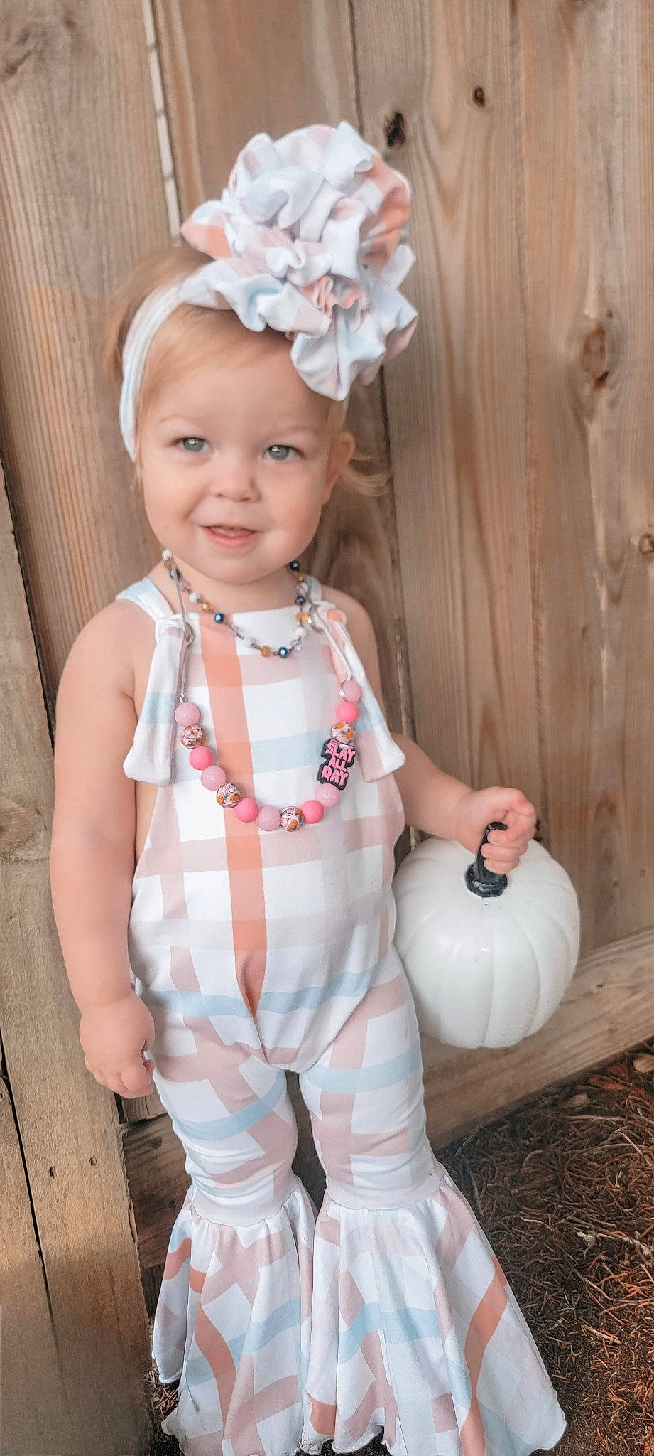 Gracelyn is registered to the contest to win money with this photo: baby, baby_products, baby_toddler_clothing, beauty, child, embellishment, facial_expression, fashion_accessory, happy, headband, headpiece, jewellery, joy, pattern, peach, person, pink, skin, sleeve, smile
